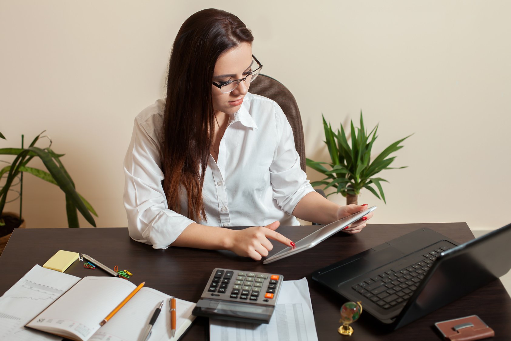 Female Bookkeeper Hands Holding Tablet Pc